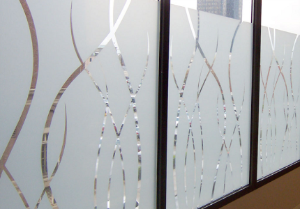 Frosted glass windows with decorative clear curved line patterns, allowing partial visibility through the glass while maintaining privacy. The design adds a modern, stylish touch to the window panels.